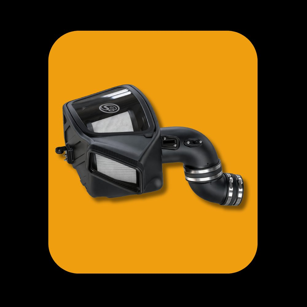 S&B cold air intake system installed on Ram Cummins 6.7L diesel engine, 2019-2024 model years.