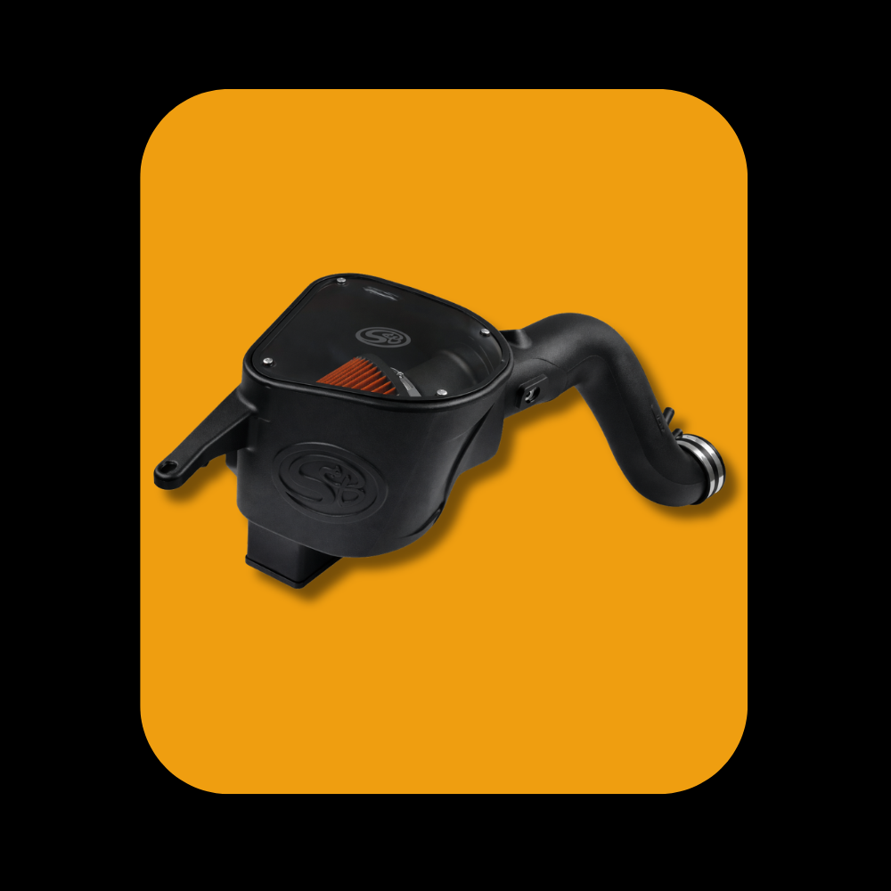 S&B cold air intake system installed on Ram Cummins 6.7L diesel engine, 2007-2012 model years.